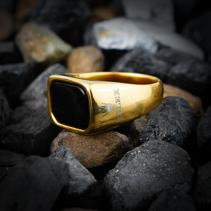 black stone golden rolex ring
