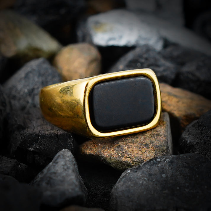 black stone golden rolex ring
